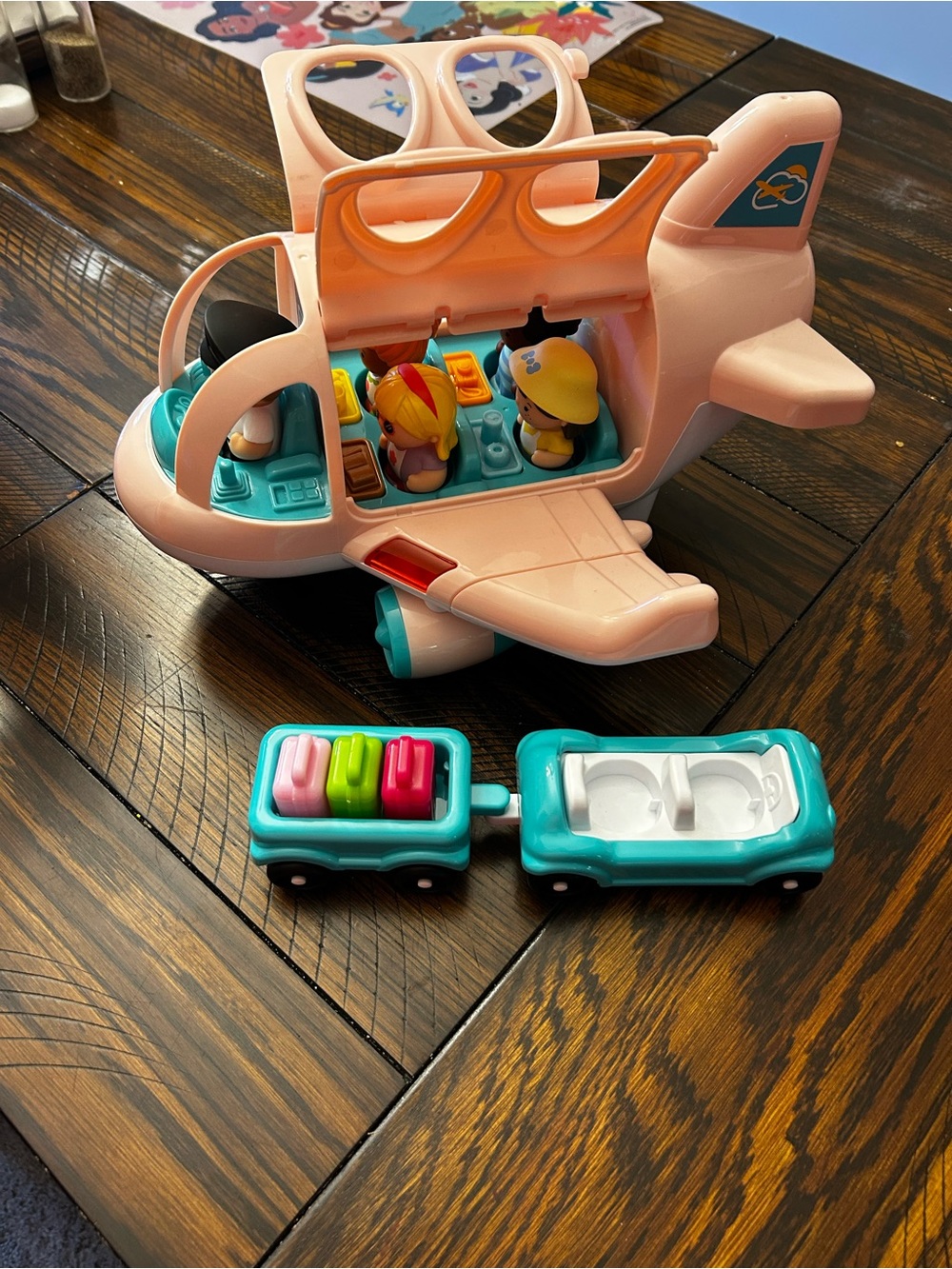 Pink Toy Airplane Playset with Mini Passenger Figures and Teal Luggage Carts